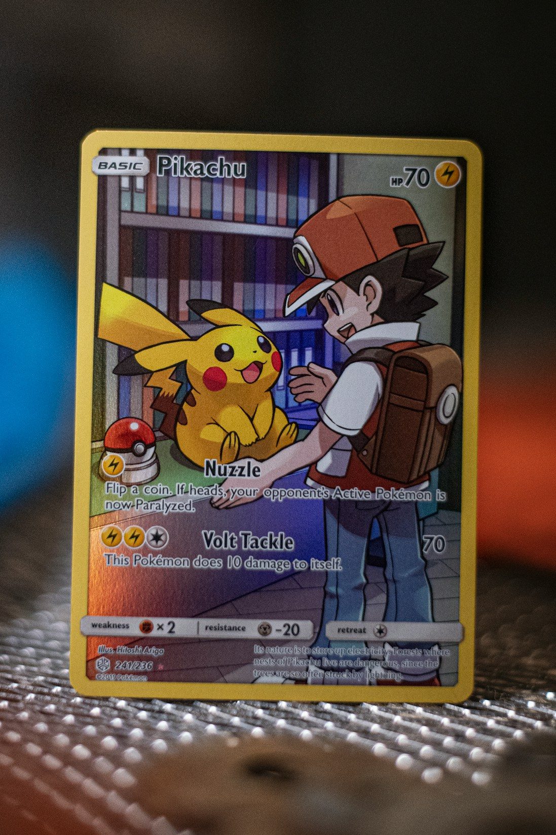 a pokemon card sitting on top of a table